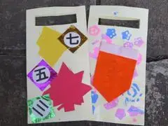 写真：切り紙したもみじを貼った袋