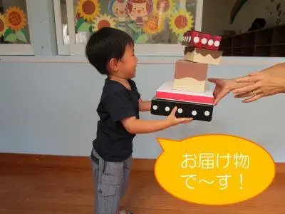 写真：ケーキ便配達の様子