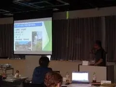 写真：先進自治会の事例発表の様子1