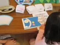 写真：かわいいおめめのこいのぼりを作った女の子