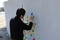 写真：6か所目作業中のイヌイマサノリさん