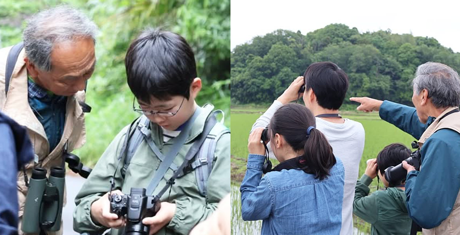 撮影した写真を確認したり双眼鏡をのぞき込む参加者